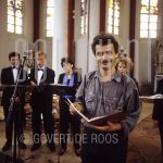 Herman Finkers (Date Unknown) on location.

[keywords]Posed, Half Length, Eyecontact, Smiling, Church[/keywords]